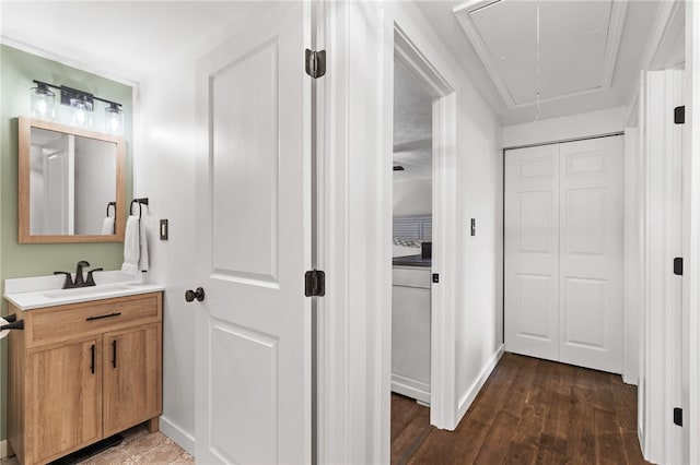 bathroom with hardwood / wood-style flooring and vanity