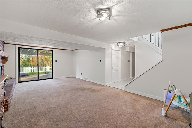 basement with a textured ceiling and light carpet