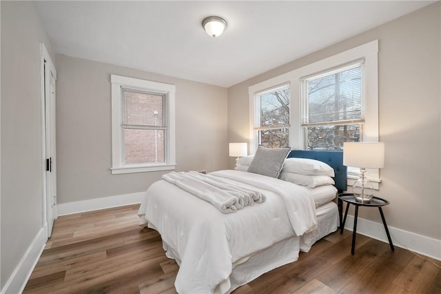 bedroom featuring hardwood / wood-style floors