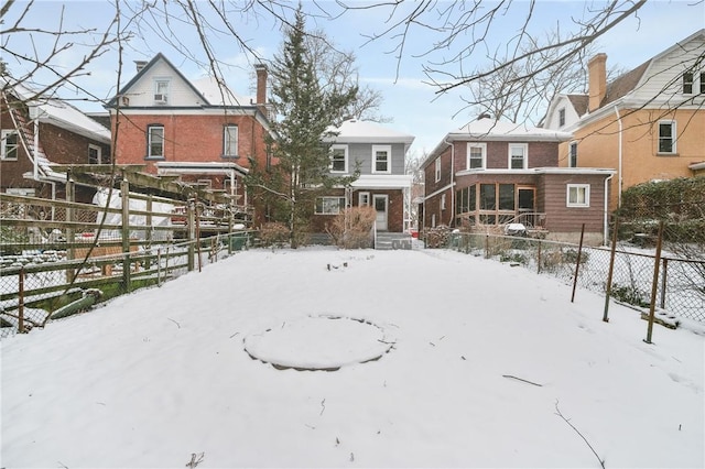 view of yard layered in snow