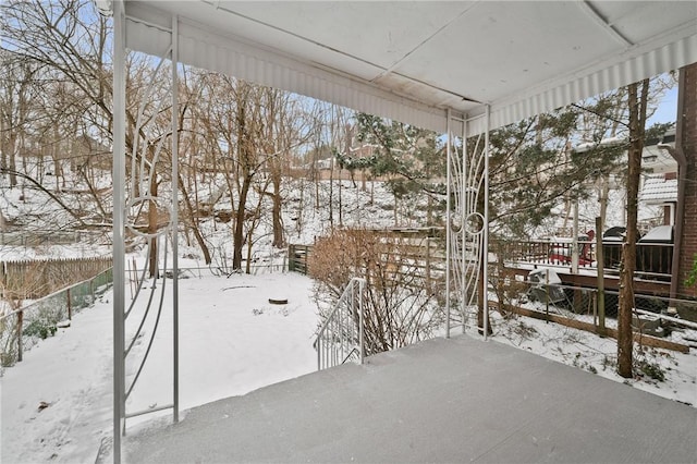 view of snow covered patio