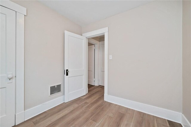 unfurnished bedroom featuring light hardwood / wood-style floors