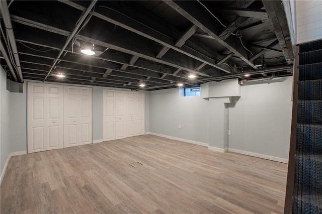 basement featuring hardwood / wood-style flooring