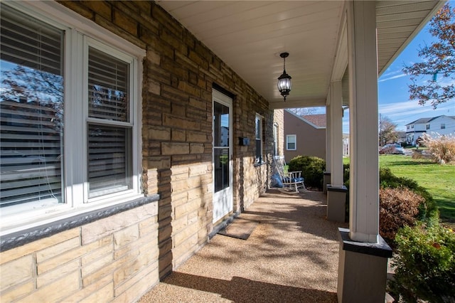 view of patio featuring a porch