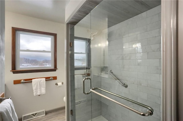 bathroom featuring walk in shower