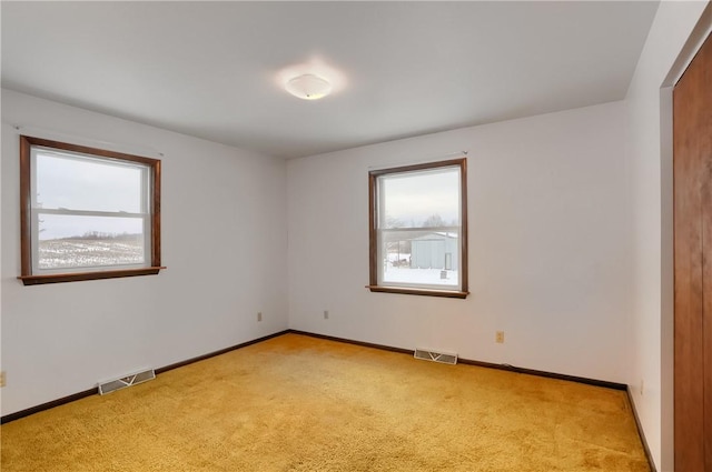 view of carpeted spare room