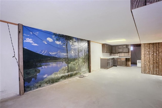 interior space featuring wood walls and a water view