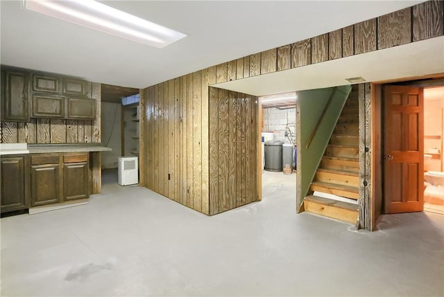 interior space featuring wood walls