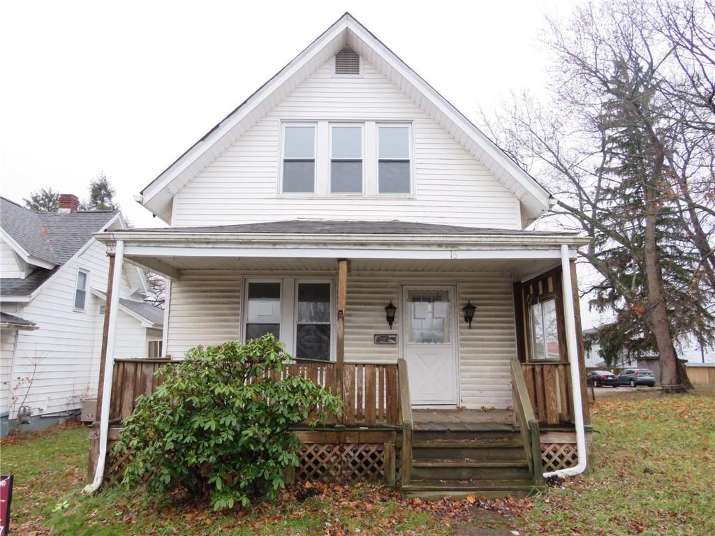 bungalow-style home with a porch