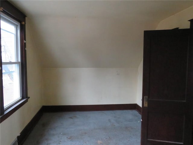 bonus room featuring lofted ceiling