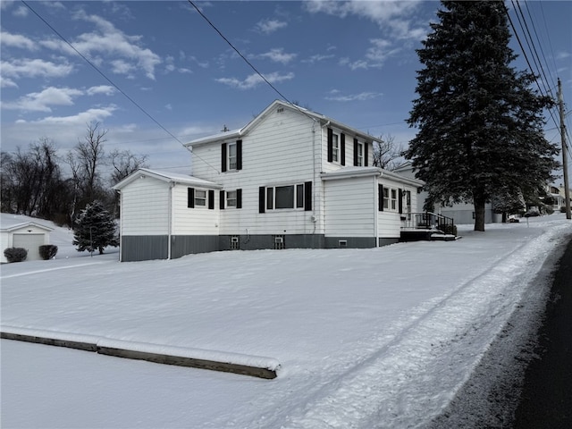 view of snow covered property