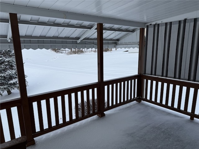 view of snow covered deck