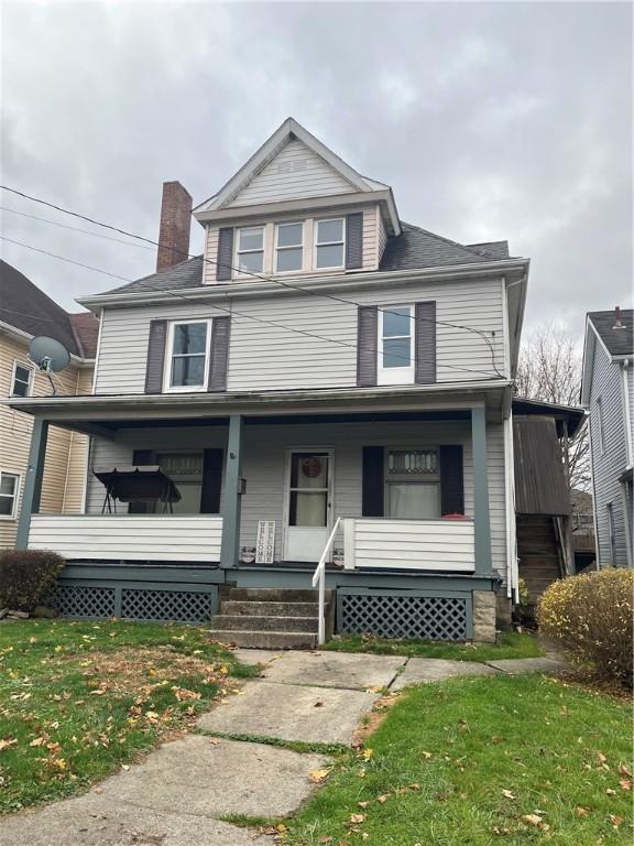 front facade with a porch