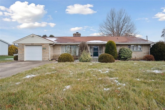 single story home featuring a garage