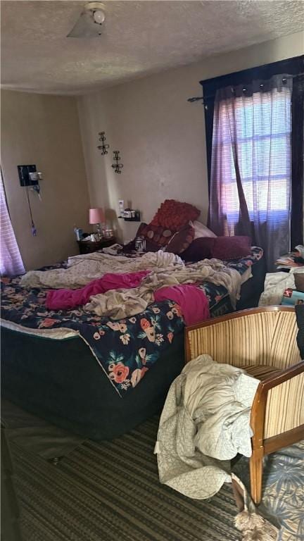 bedroom with a textured ceiling