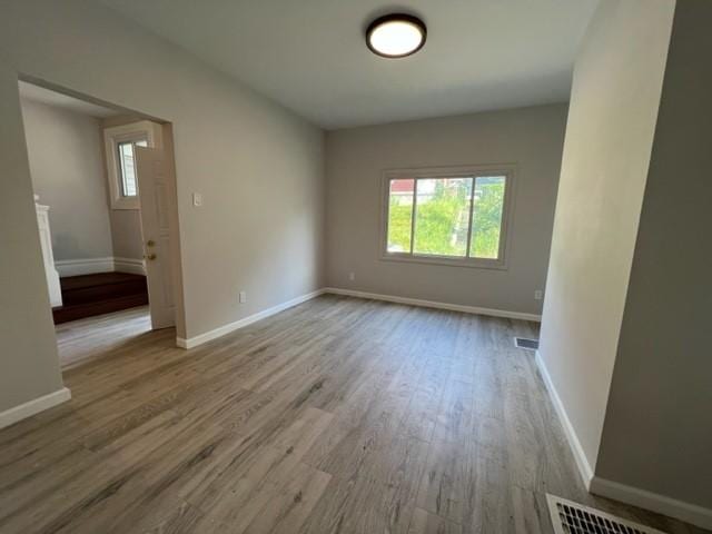 empty room with light wood-type flooring