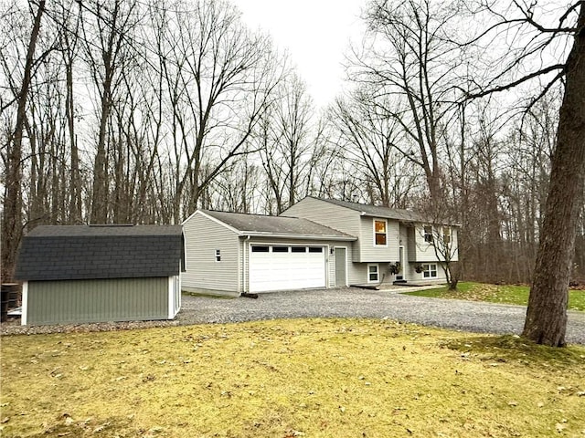 bi-level home with a front lawn