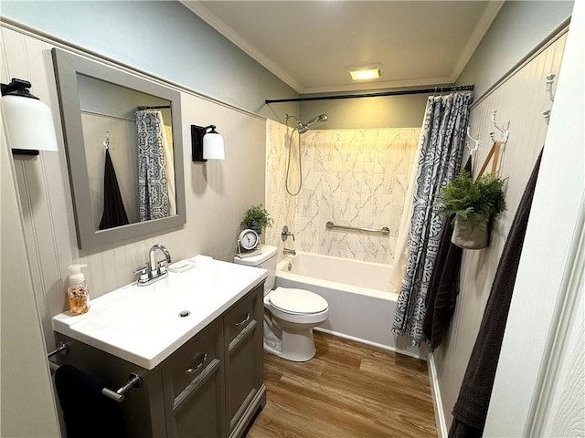 full bathroom featuring crown molding, hardwood / wood-style floors, vanity, and shower / tub combo with curtain