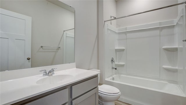 full bathroom featuring vanity, shower / washtub combination, and toilet