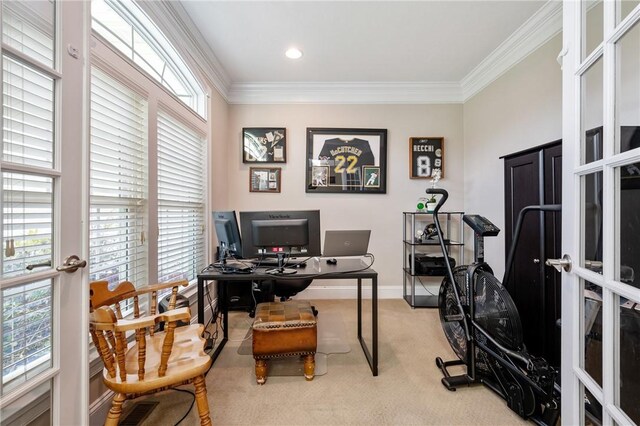 home office with crown molding, carpet, and french doors