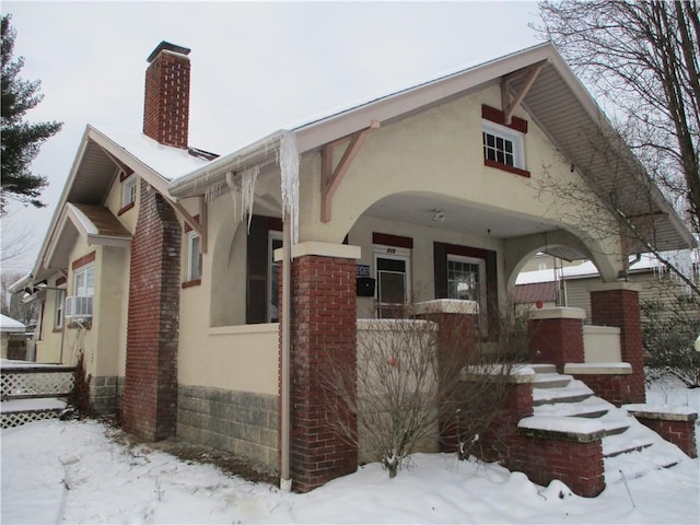 view of front of property featuring covered porch