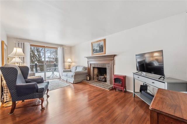 living room featuring hardwood / wood-style floors and a fireplace