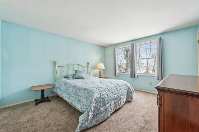 bedroom with light carpet