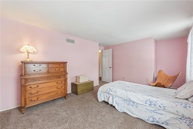 bedroom featuring carpet