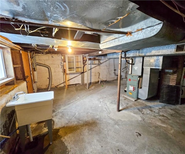 basement featuring heating unit