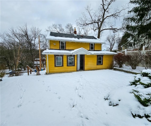 view of snow covered property