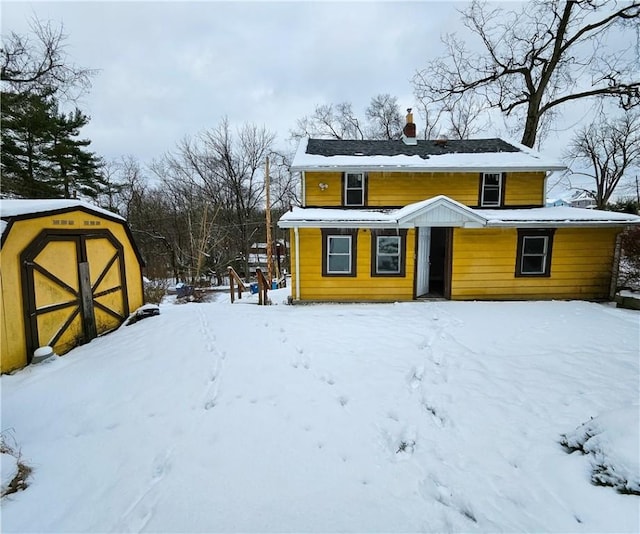 exterior space featuring a shed