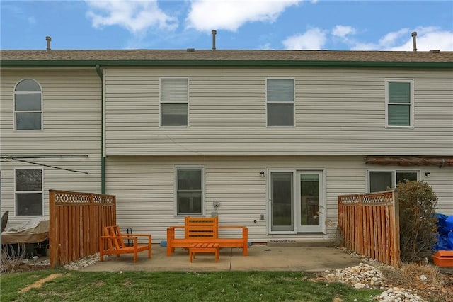 rear view of property with a patio area