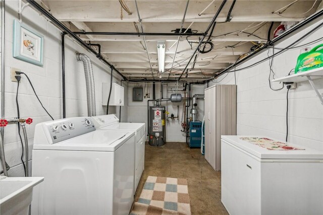 laundry area featuring independent washer and dryer, sink, electric panel, and water heater