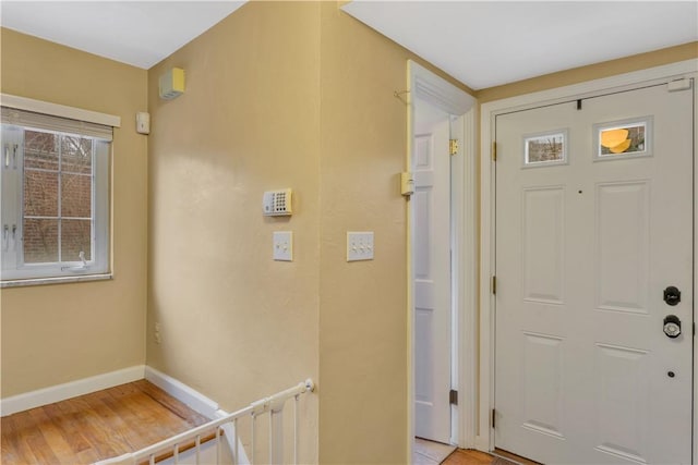 entryway with light hardwood / wood-style floors