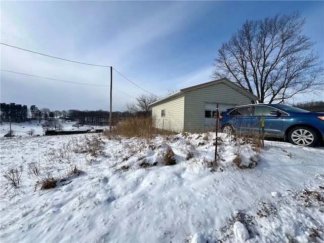 view of yard covered in snow