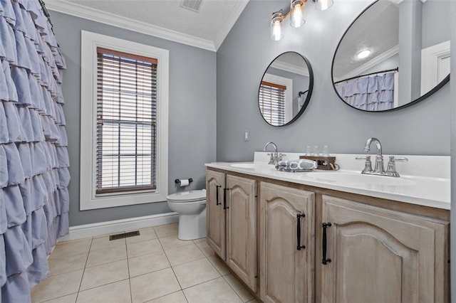 bathroom featuring vanity, crown molding, tile patterned flooring, toilet, and a textured ceiling