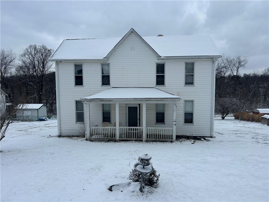 view of front of house with covered porch