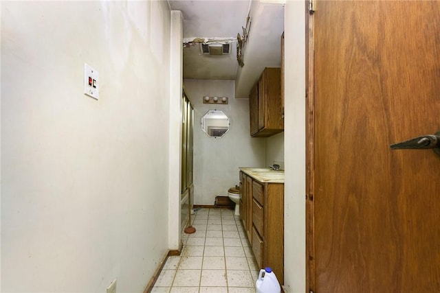 full bathroom featuring shower / tub combination, vanity, and toilet