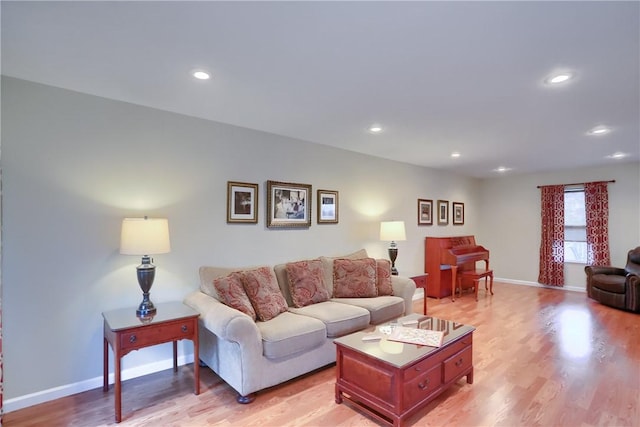 living room with light hardwood / wood-style floors