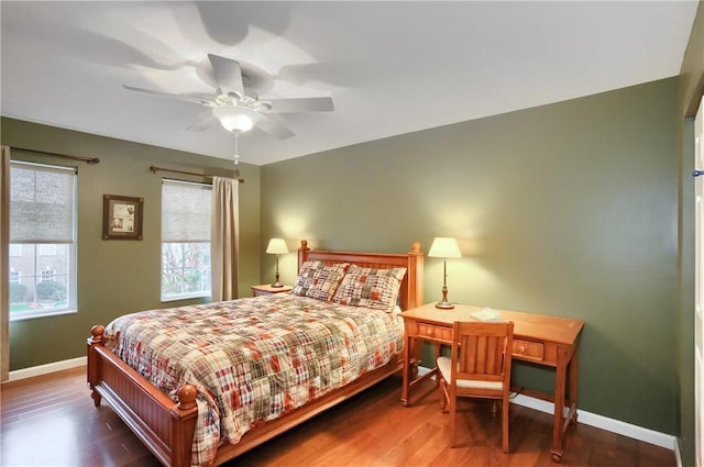 bedroom with hardwood / wood-style flooring and ceiling fan