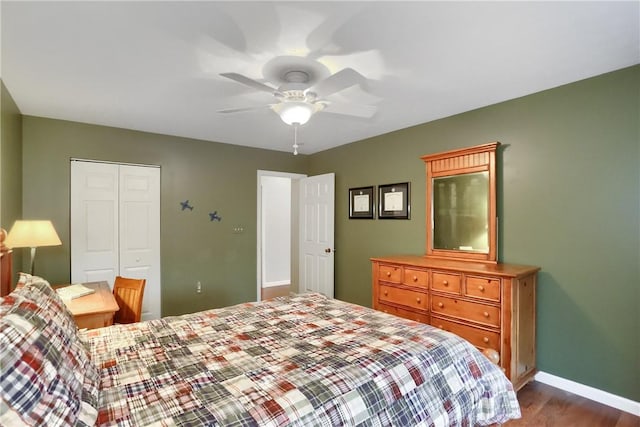 bedroom featuring ceiling fan, a closet, and hardwood / wood-style floors