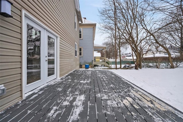 view of snow covered deck