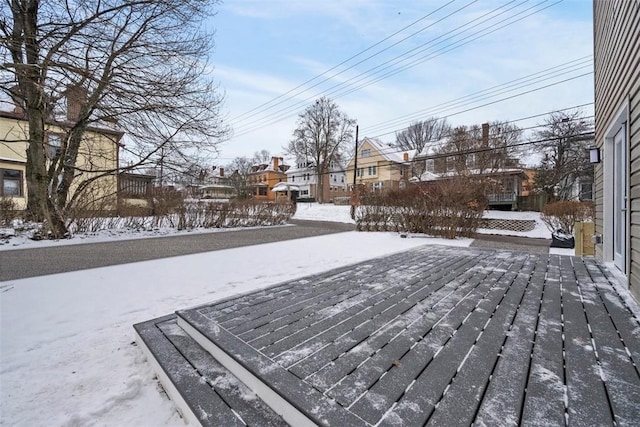 view of snow covered deck