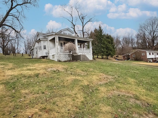 exterior space featuring a front yard and a porch