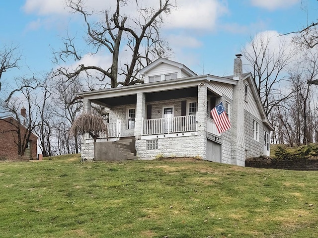 view of front of house featuring a porch and a front lawn