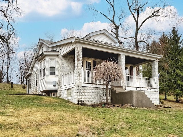 exterior space with a yard and a porch