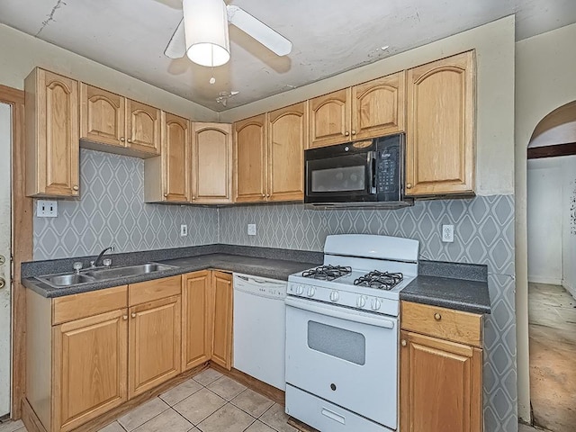 kitchen with backsplash, white appliances, ceiling fan, sink, and light tile patterned floors