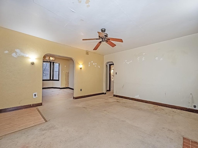 spare room with ceiling fan