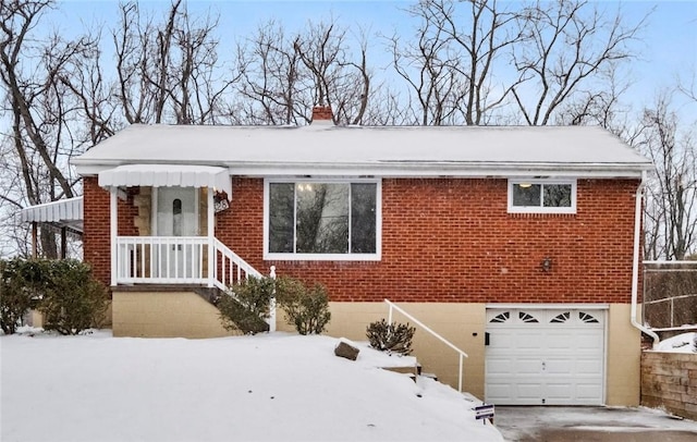 view of front of home with a garage