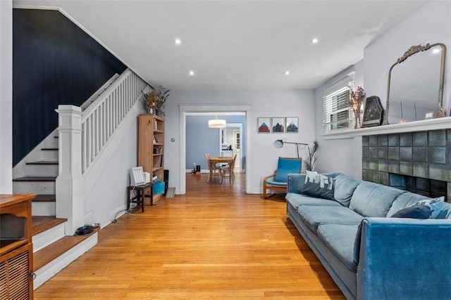 living room with light hardwood / wood-style flooring